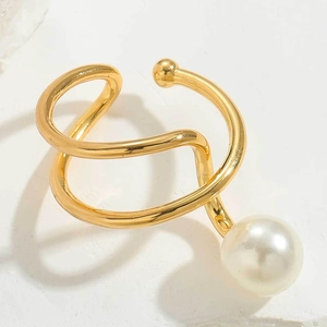 Detail showing the 925 sterling silver stamp on a gold-plated pearl ear cuff accessory