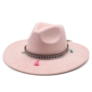 Pink wide brim suede fedora hat with ethnic woven band and colorful tassels