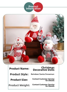 Detailed view of handcrafted Santa, Snowman, and Reindeer dolls on a rustic wooden box