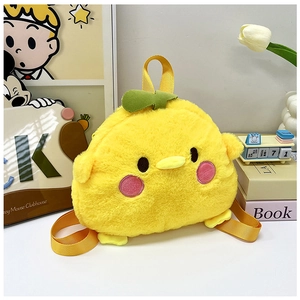 Detail of yellow plush cartoon chicken backpack for children with cute soft texture