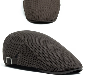 Detail of dark brown mesh newsboy cap showing breathable fabric and metal side buckle