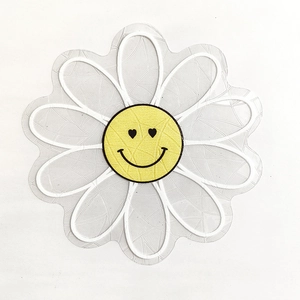 Detail of daisy suncatcher static glass sticker with yellow smiley face and heart eyes