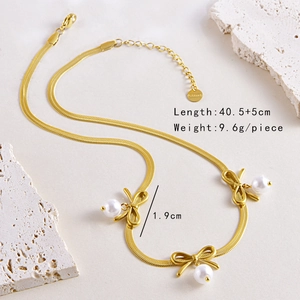Golden flat snake chain necklace with pearl bow pendants and adjustable lobster clasp