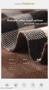 Close-up of thick plaid scarf texture with soft brushed cashmere feel and fringed edges