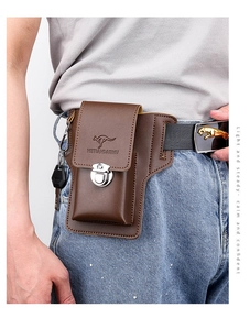 Detailed view of a brown leather phone holster for men with a buckle and side key ring
