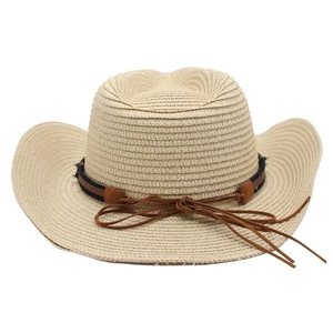 Detail of hand-woven straw cowboy hat featuring a leather band and decorative rivets