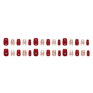 Short square cat-eye press-on nails with 3D red bows and festive glitter designs