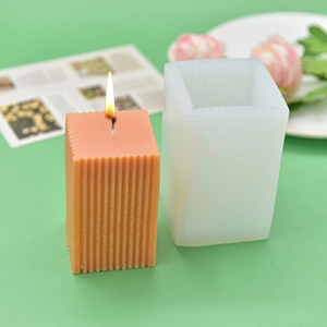 Food-grade square striped silicone mold for DIY candles with finished burning candle