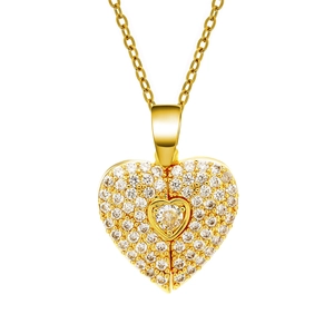 Elegant gold heart pendant necklace with shimmering micro-pave zirconia on white background