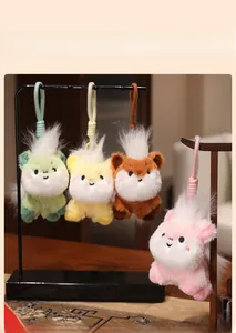 Detailed display of colorful plush horse keychains in green, yellow, brown, and pink hues