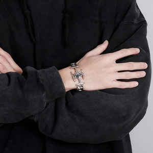 Close-up of men's titanium steel bracelet with anchor design on a model's wrist