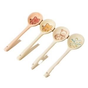 Set of four minimalist ceramic spoons with cute cartoon bear motifs and long handles