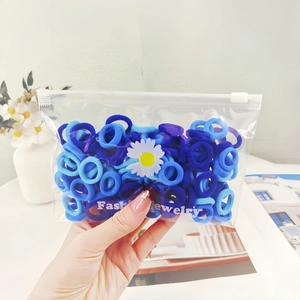Blue and purple high-elastic cotton hair ties in a daisy waterproof zipper bag
