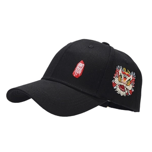 Black cotton baseball cap with Chinese lion embroidery and red patch text at 45-degree angle