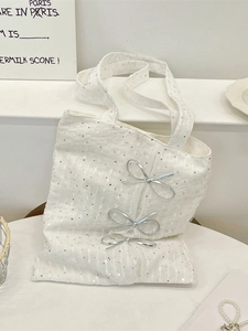 Elegant white canvas tote bag with silver sequins and three 3D bow accents