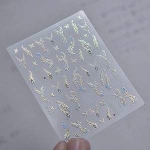 Detailed holographic nail sticker featuring Phoenix and butterfly with aurora effect