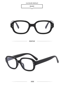 Detail view showing black oval frame sunglasses from both front and side angles