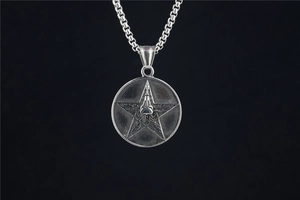Detail of silver pentagram pendant on stainless steel chain with vintage finish