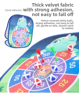 Detail of dinosaur folding target board with colorful scoring zones and sticky balls