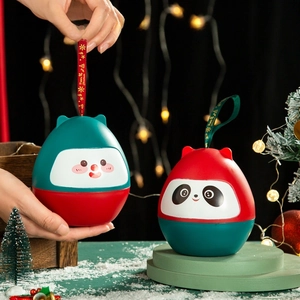 Panda themed Daruma Christmas gift boxes with festive ribbons and winter snow decor