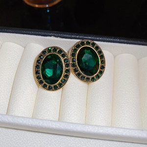 French vintage oval emerald stud earrings with gold plating and green crystals