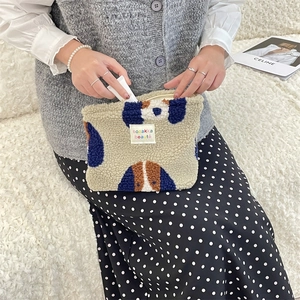 Beige plush makeup bag with blue and brown polka dots and high capacity storage