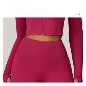 Close-up of berry workout set featuring a high-waist yoga legging with anti-roll design