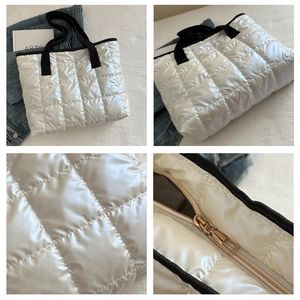 Detailed views of white quilted puffer tote with black straps and secure zipper closure