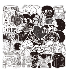 Close-up of waterproof black and white punk graffiti stickers with various cool designs