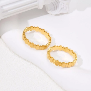 Chic gold-toned stainless steel rings featuring a minimalist stacked oval link design