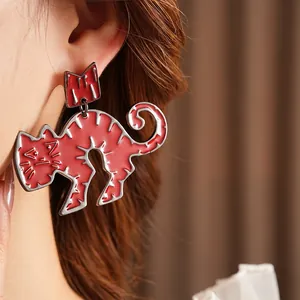 Chic silver needle earrings with cartoon red cat crown design for a stylish women look