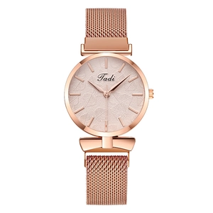 Women's rose gold quartz watch with leaf texture dial and magnetic Milanese mesh band