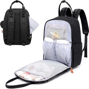 Interior view of black maternity backpack showing multiple mesh pockets and storage space