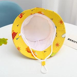 Detail of yellow kids sun hat with adjustable windproof drawstring and size label 52