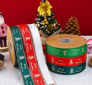 Christmas ribbed ribbon with gold festive trees and Merry Christmas script for gift wrapping