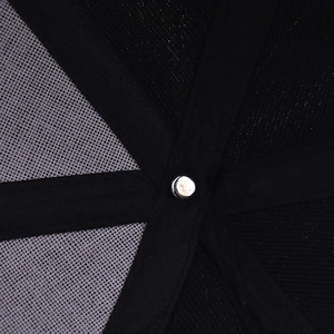 Detail view of the baseball cap's internal seams with black tape and mesh construction