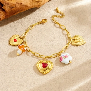 Gold plated heart and ceramic mushroom pendant necklace with colorful floral patterns