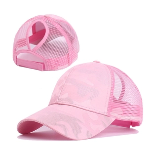Pink ponytail baseball cap featuring camo print fabric and breathable mesh design