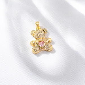 14K gold plated bear pendant with sparkling white zircons and pink heart gemstone