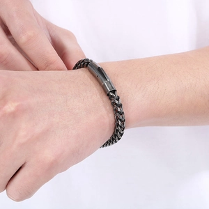 Close-up of vintage silver dragon bone chain bracelet with cylindrical plug-in clasp
