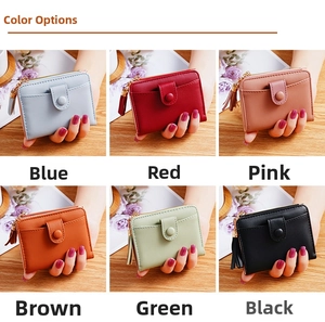 Detailed view of women's compact PU leather wallets in six colors with decorative tassels
