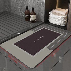 Detail view of a modern gray HOME bath mat with size dimensions 50cm x 80cm