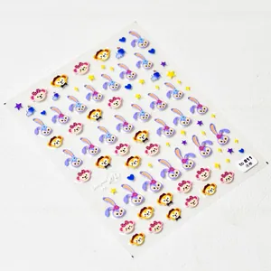 Close-up of 5D embossed nail stickers featuring cute cartoon bear and rabbit characters