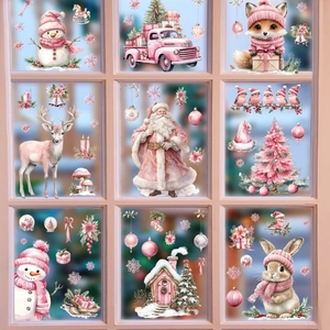 Pink and white Christmas window stickers featuring Santa, snowman, elk and pink truck decor