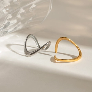 Minimalist wavy open rings in gold and silver finish with polished stainless steel design