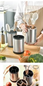 Close-up of rotating stainless steel utensil holder with internal compartment dividers