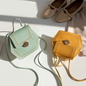 Minimalist hexagonal leather satchel bags in mint green and mustard yellow for women