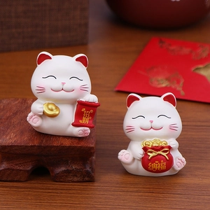 Set of two lucky cat figurines on wood base for desk or car dashboard decoration