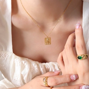 Ancient Egyptian pendant necklace and gold rings with emerald and zircon stones