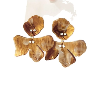Elegant amber resin flower drop earrings with sparkling rhinestones and gold-tone finish